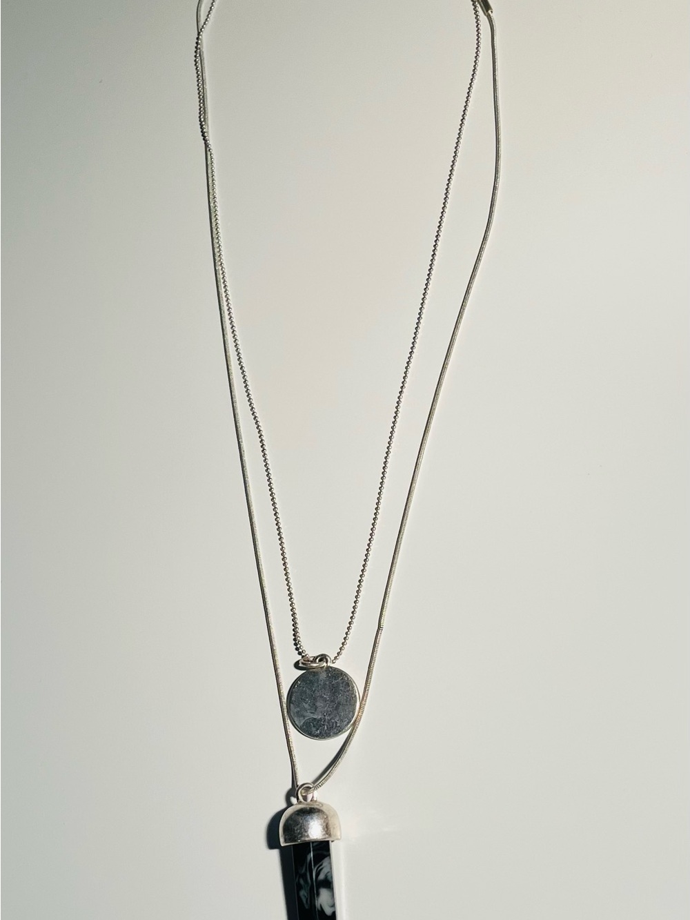 19” Silver Toned Layered Pendant Necklace with Black Marble-style Drop